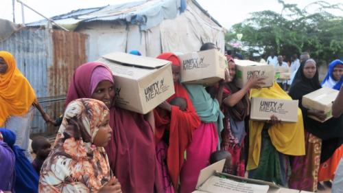 Distributing aid supplies to IDPs used